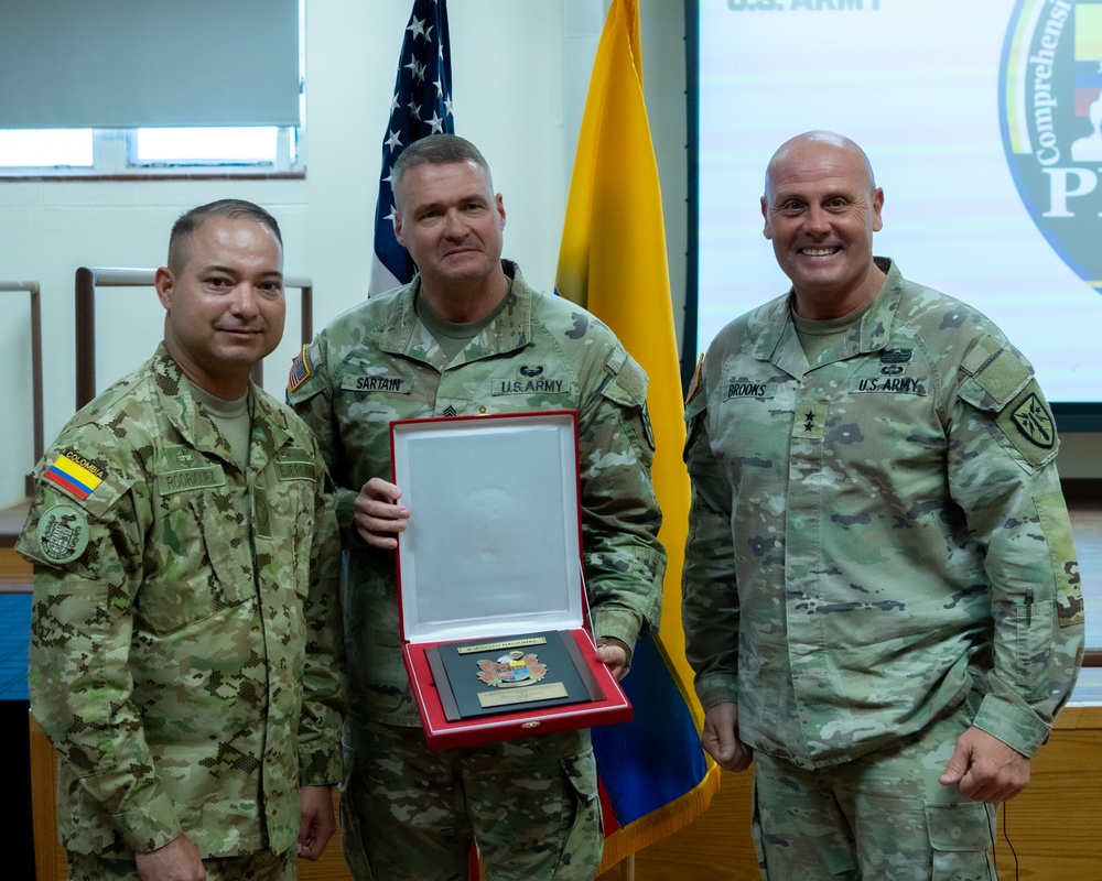 SM Rodriguez presents CSM Neil H. Sartain with a plaque of appreciation on May 16th, 2025