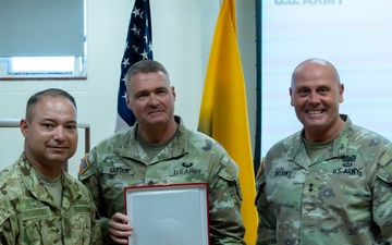 SM Rodriguez presents CSM Neil H. Sartain with a plaque of appreciation on May 16th, 2025