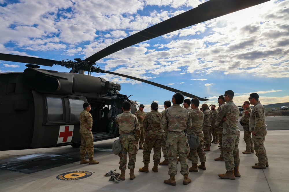 Soldiers of the 62nd Medical Brigade participate in a Medical Evacuation Training
