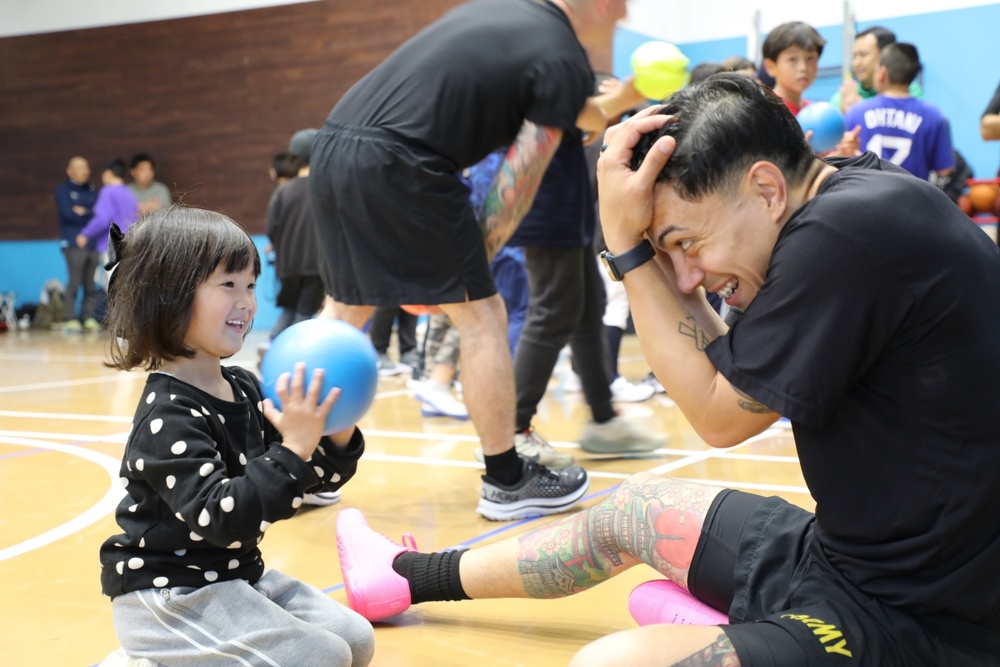 Soldiers in Yokohama engage with local youth during inaugural sports exchange