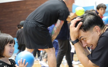 Soldiers in Yokohama engage with local youth during inaugural sports exchange