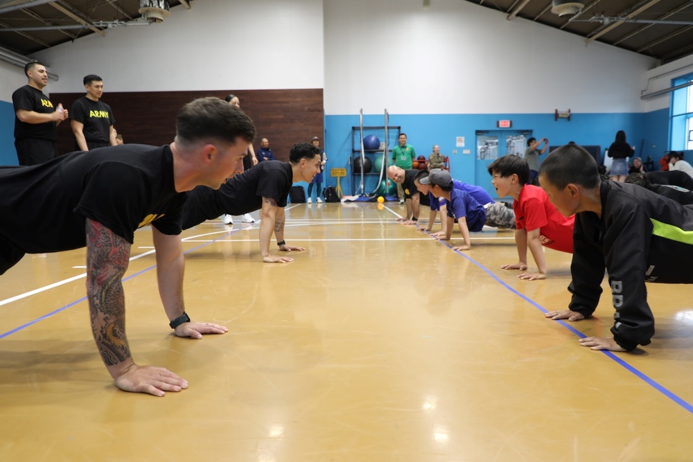 Soldiers in Yokohama engage with local youth during inaugural sports exchange