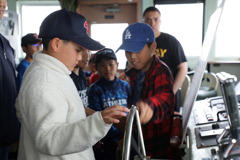 Soldiers in Yokohama engage with local youth during inaugural sports exchange
