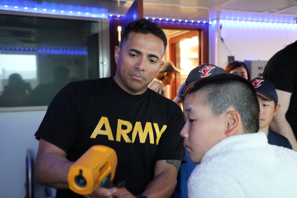 Soldiers in Yokohama engage with local youth during inaugural sports exchange
