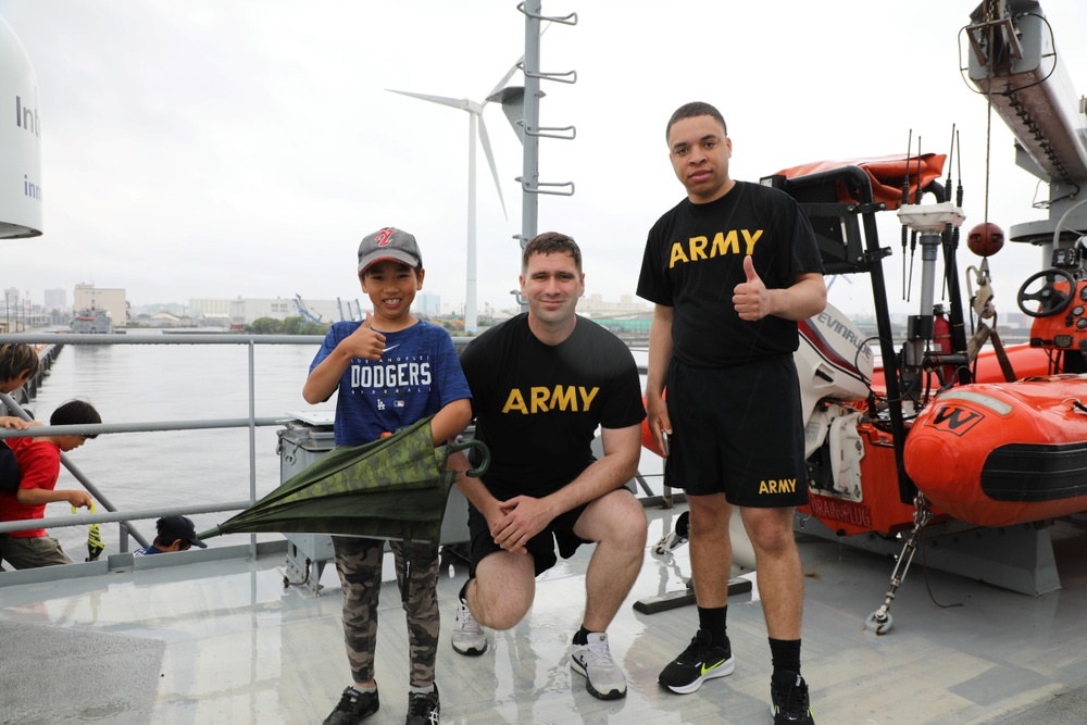 Soldiers in Yokohama engage with local youth during inaugural sports exchange