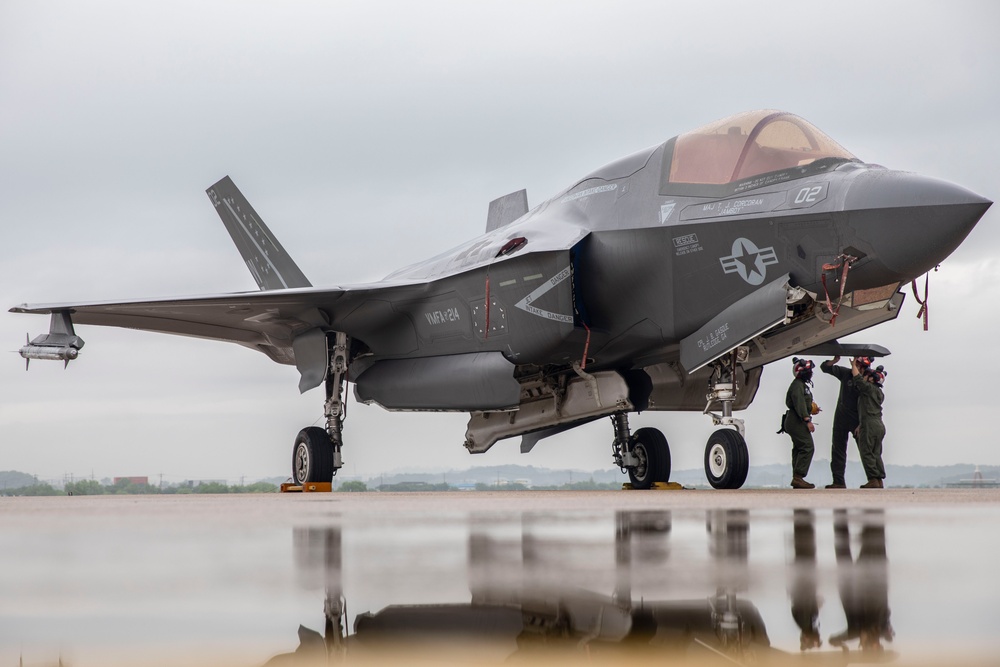 U.S. Marines load ordnance onto F-35B