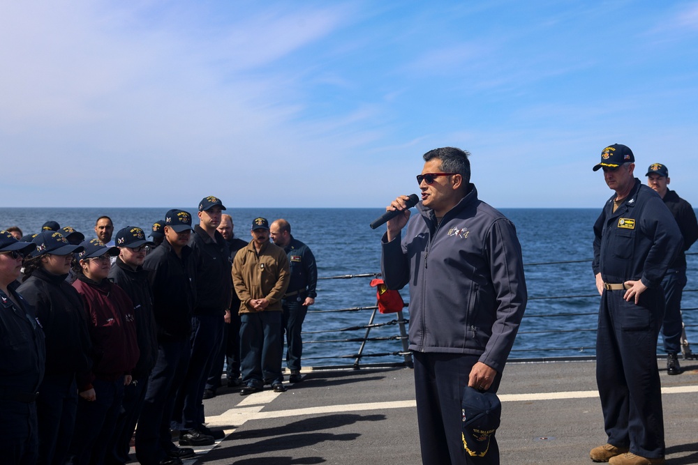 Cmdr. Arturo Trejo introduces Capt. Michael Dwan, commodore, Combined Task Force (CTF) 64