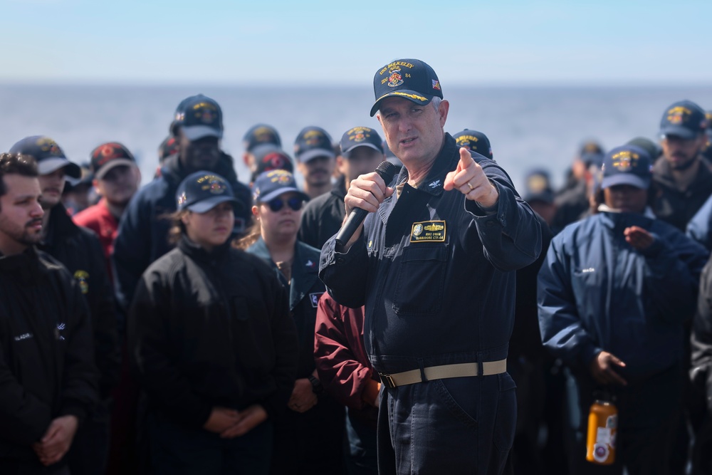 Capt. Michael Dwan, commodore, Combined Task Force (CTF) 64  delivers remarks to the crew of the USS Bulkeley (DDG 84)