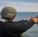 Gunner’s Mate 2nd Class Joshua Cvitic fires an M2A1 50-caliber gun