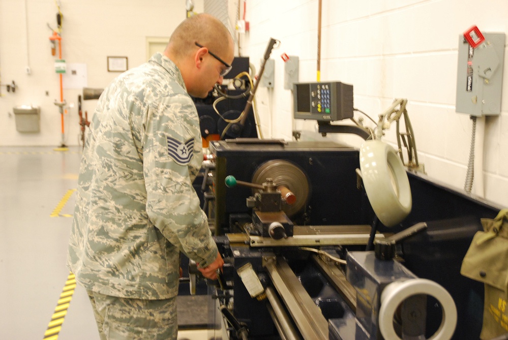AFRL/RW technician working in a fabrication lab.