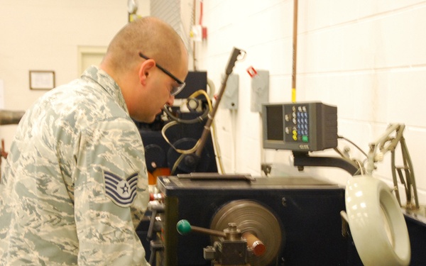 AFRL/RW technician working in a fabrication lab.