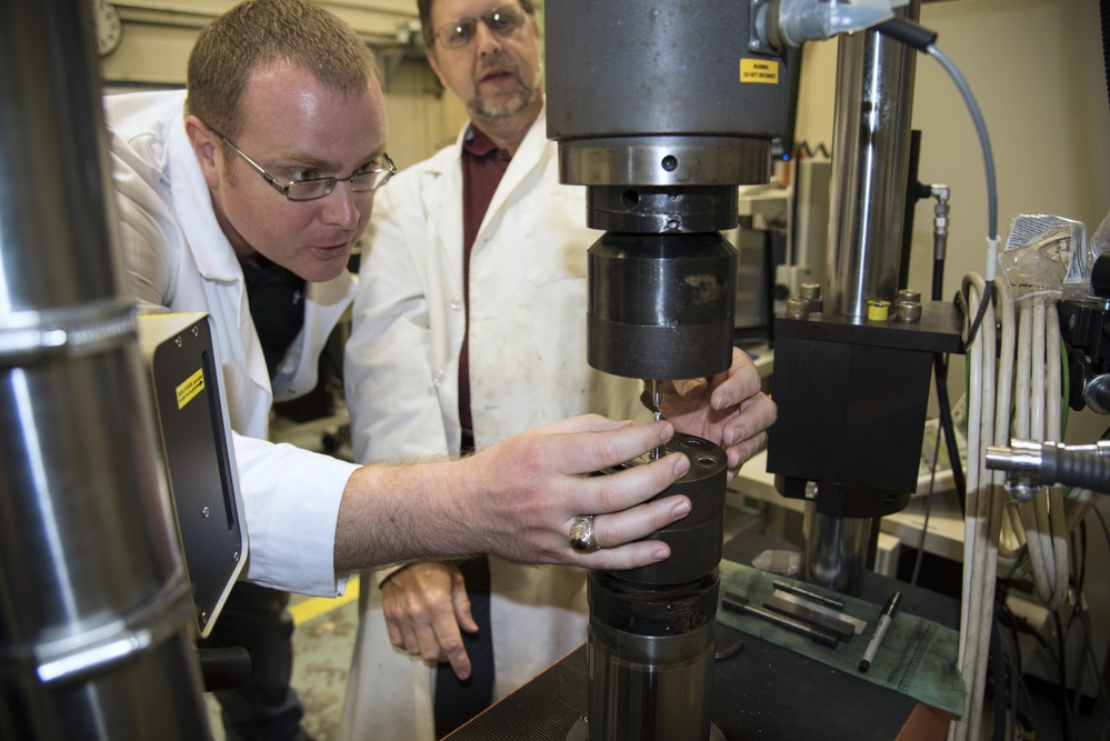 AFRL/RW scientists working in a fabrication laboratory
