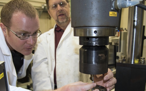 AFRL/RW scientists working in a fabrication laboratory