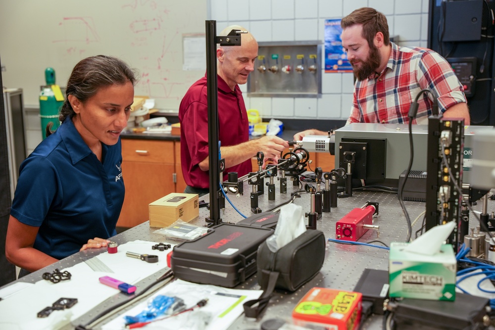 AFRL/RW scientists prepare an experiment