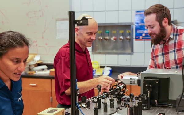 AFRL/RW scientists prepare an experiment