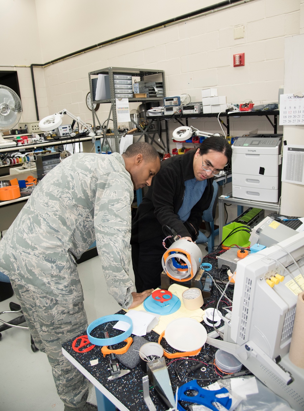 AFRL/RW scientists working in a fabrication laboratory