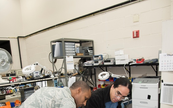 AFRL/RW scientists working in a fabrication laboratory
