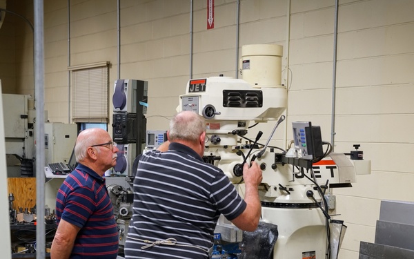 AFRL/RW technicians working in a fabrication laboratory