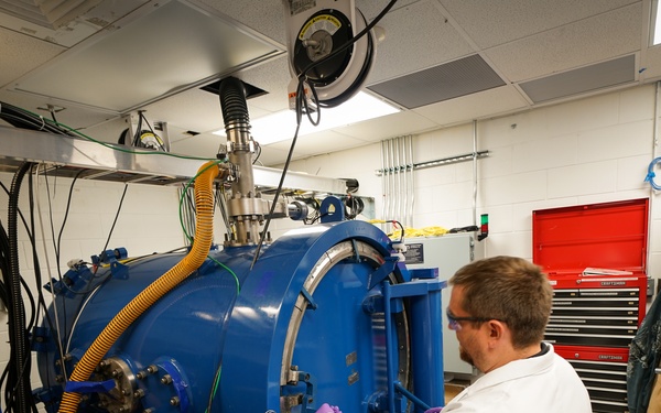 AFRL/RW scientist working in an energetics testing laboratory