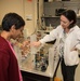 AFRL/RW scientist working in a photonics laboratory.