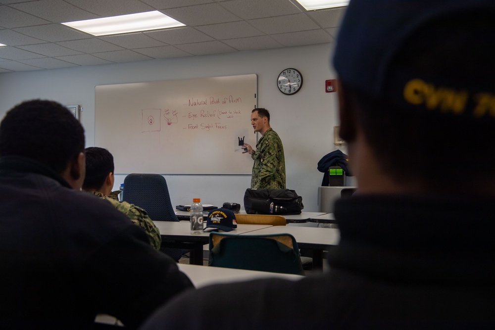 USS Ronald Reagan (CVN 76) Sailors qualify at the range