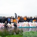 Blue Ridge Sailors clean a beach with the New Zealand Defence Force