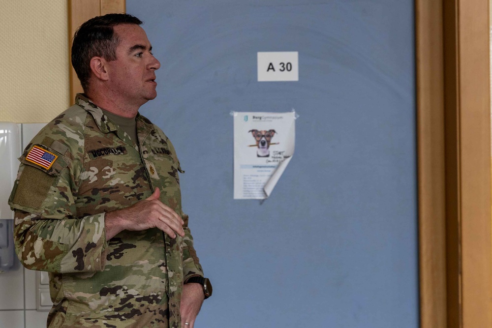 21st TSC Officers Brief Sustainment Capabilities to BurgGymnasium