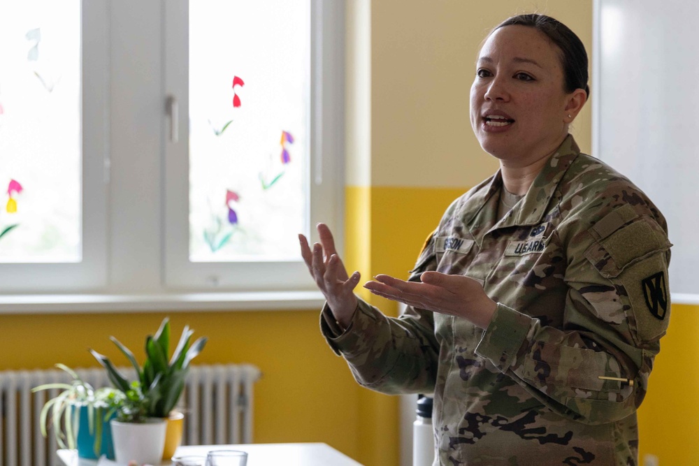 21st TSC Officers Brief Sustainment Capabilities to BurgGymnasium