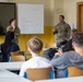 21st TSC Officers Brief Sustainment Capabilities to BurgGymnasium