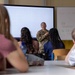 21st TSC Officers Brief Sustainment Capabilities to BurgGymnasium