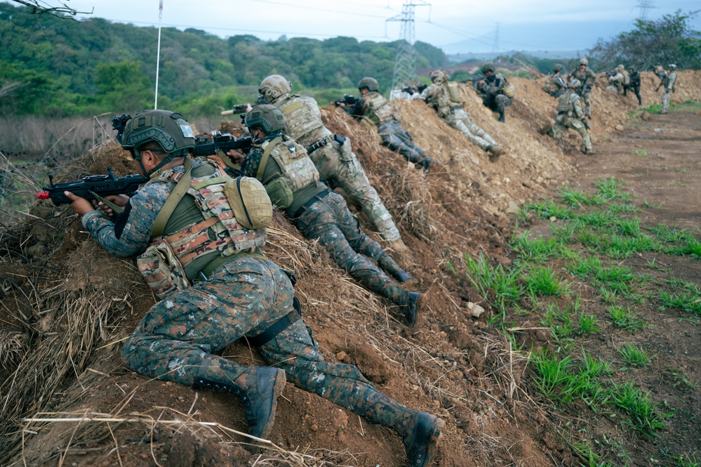Squad attack with Guatemalan partner forces on objective