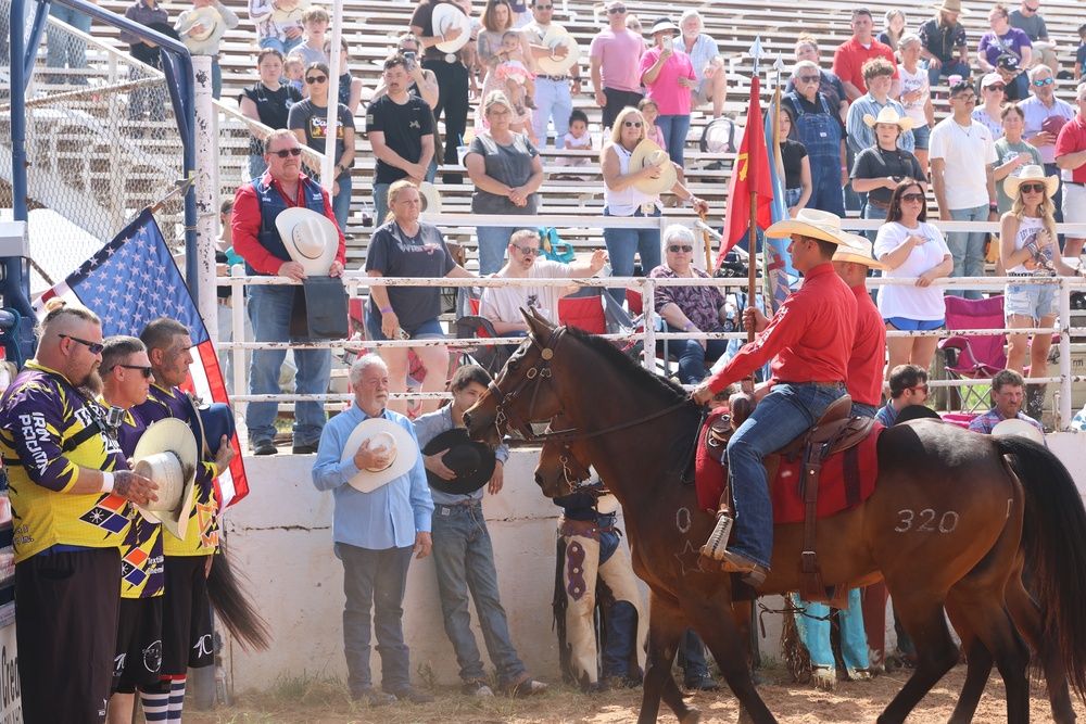 Fort Sill Half Section presents color guard for bull riding event