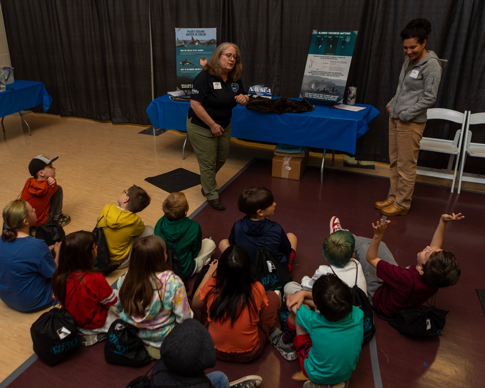 Naval Warfare Center employees explore marine mammal adaptations with students at Kitsap Water Festival