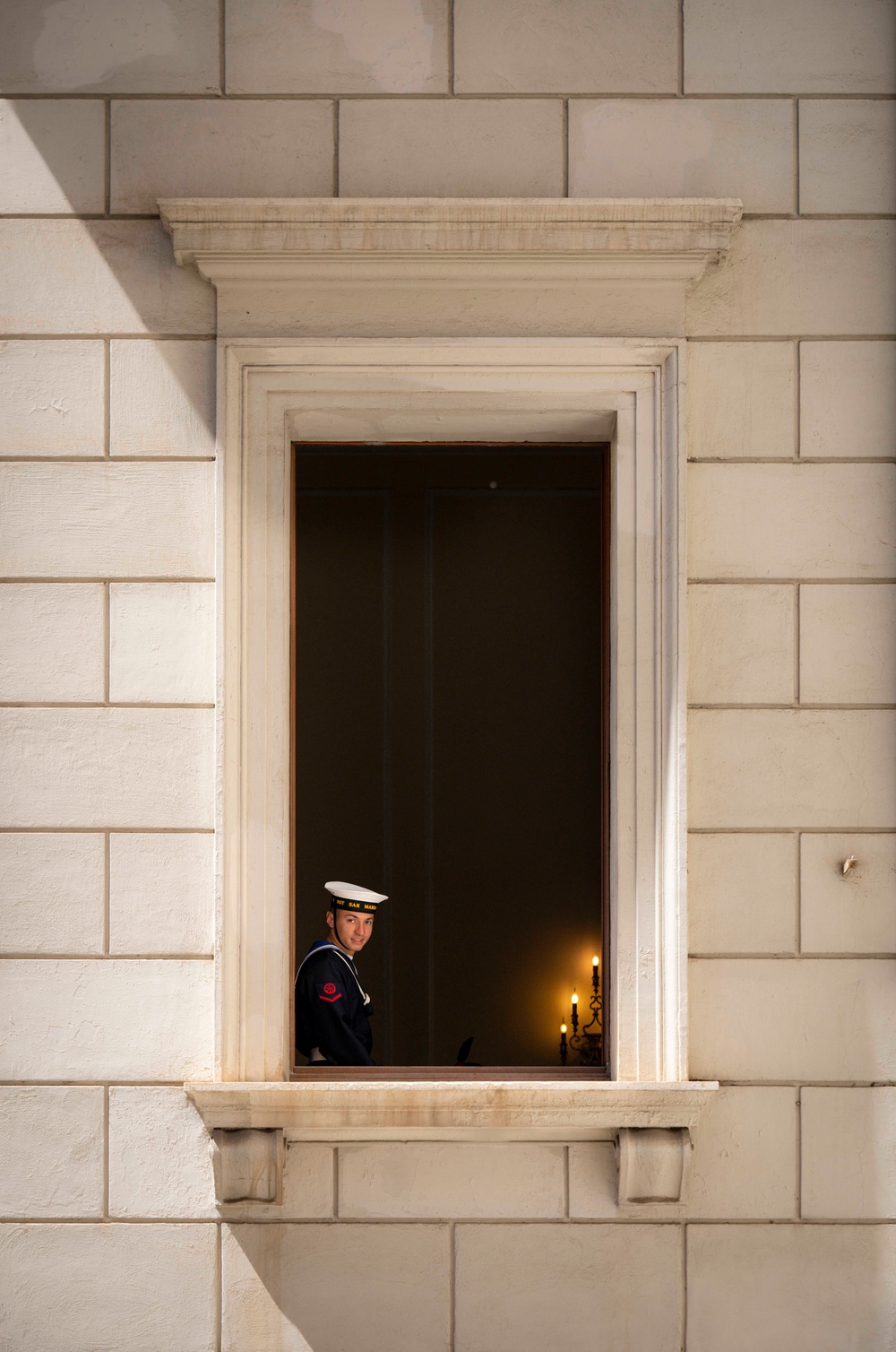Italian Service Member Looks Out Window