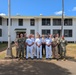 US Navy and Chilean Navy Musicians Pose in Front of Pacific Fleet Band Hall