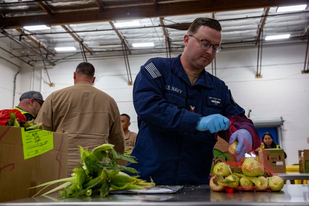 Sailors and Marines volunteer at the Los Angeles Regional Food Bank for LA Fleet Week
