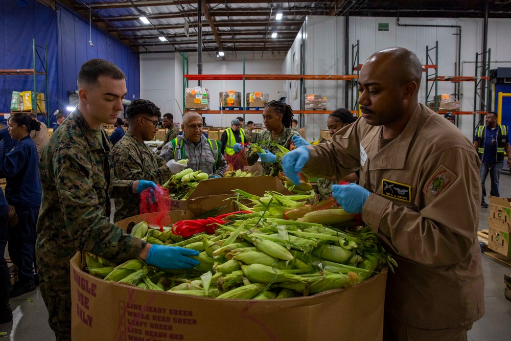 Sailors and Marines volunteer at the Los Angeles Regional Food Bank for LA Fleet Week