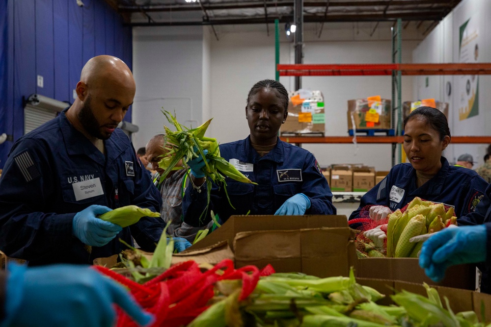 Sailors and Marines volunteer at the Los Angeles Regional Food Bank for LA Fleet Week