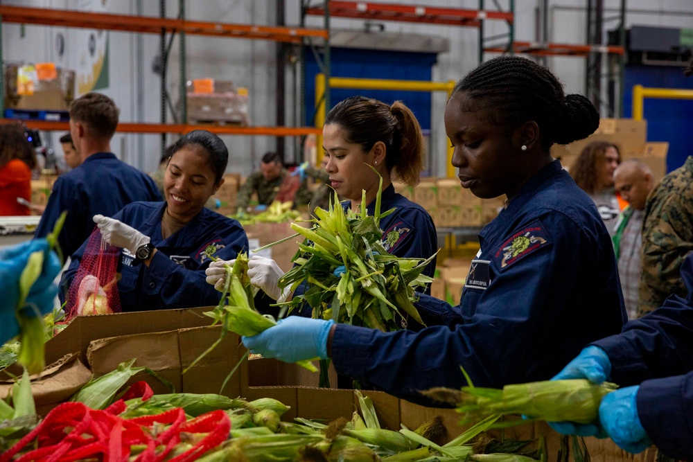 Sailors and Marines volunteer at the Los Angeles Regional Food Bank for LA Fleet Week