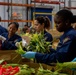 Sailors and Marines volunteer at the Los Angeles Regional Food Bank for LA Fleet Week