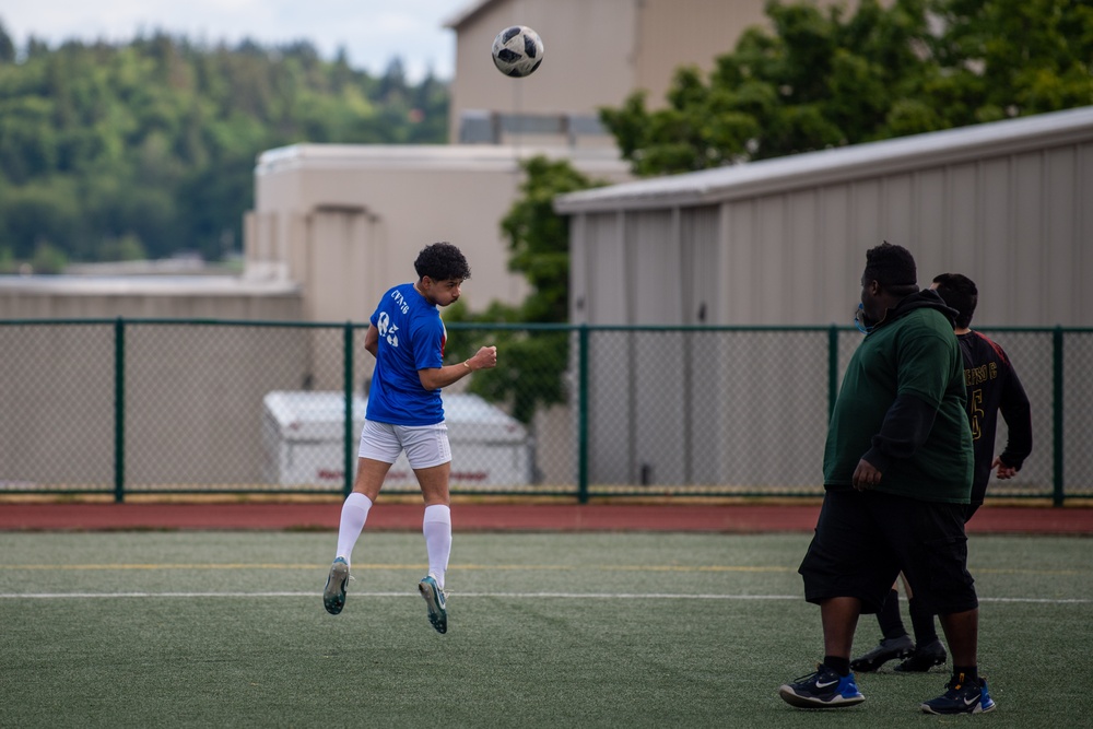 USS Ronald Reagan (CVN 76) Sailors play in an intramural soccer game