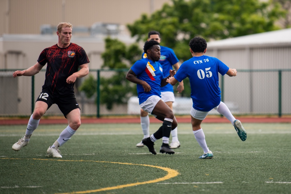 USS Ronald Reagan (CVN 76) Sailors play in an intramural soccer game