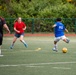 USS Ronald Reagan (CVN 76) Sailors play in an intramural soccer game
