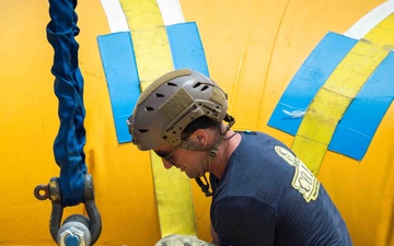MDSU-1 divers install buoys and anchors around USS Arizona Memorial