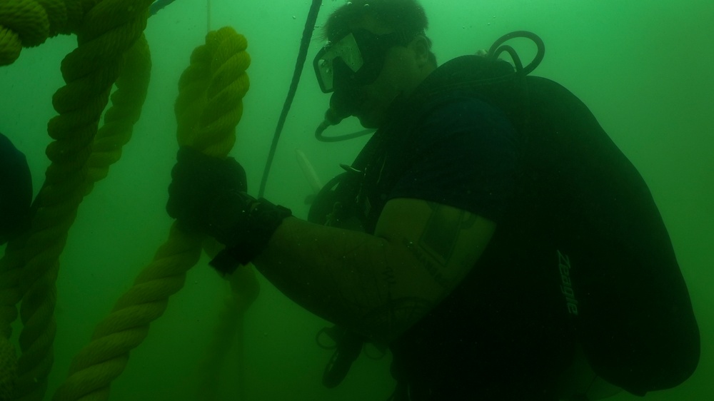 MDSU-1 divers install buoys and anchors around USS Arizona Memorial