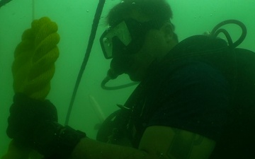 MDSU-1 divers install buoys and anchors around USS Arizona Memorial