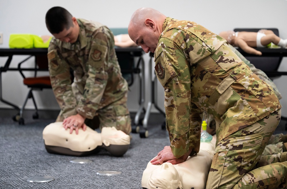 374 AW leadership, front office personnel attend CPR/AED course