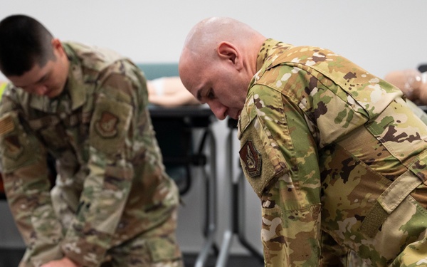 374 AW leadership, front office personnel attend CPR/AED course