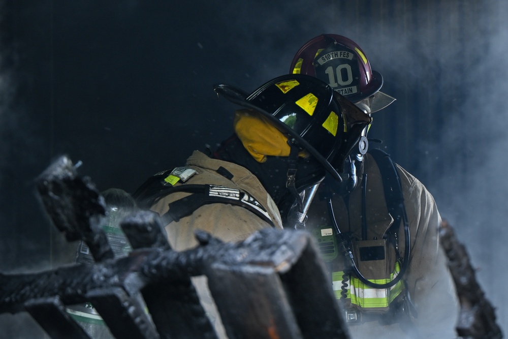 Firefighters face the flames
