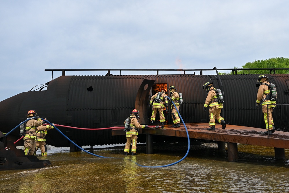 Firefighters face the flames